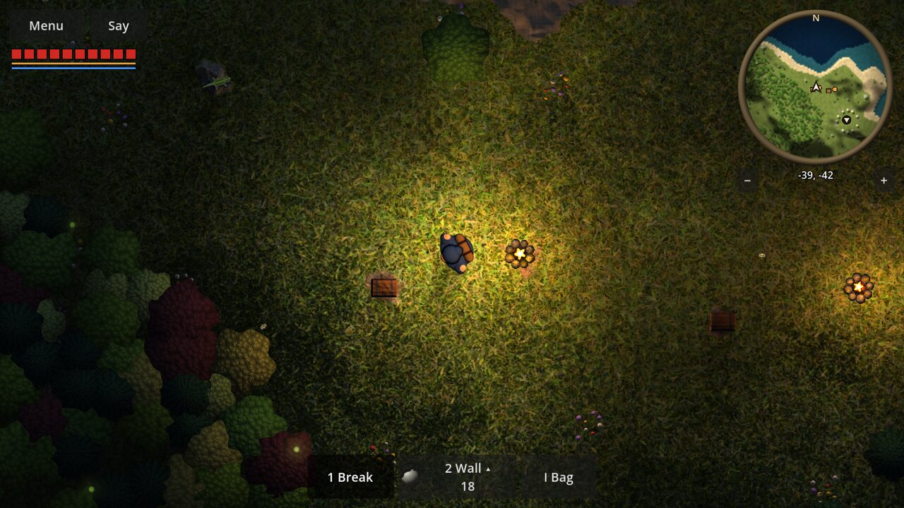 A camp at night, lit by a campfire